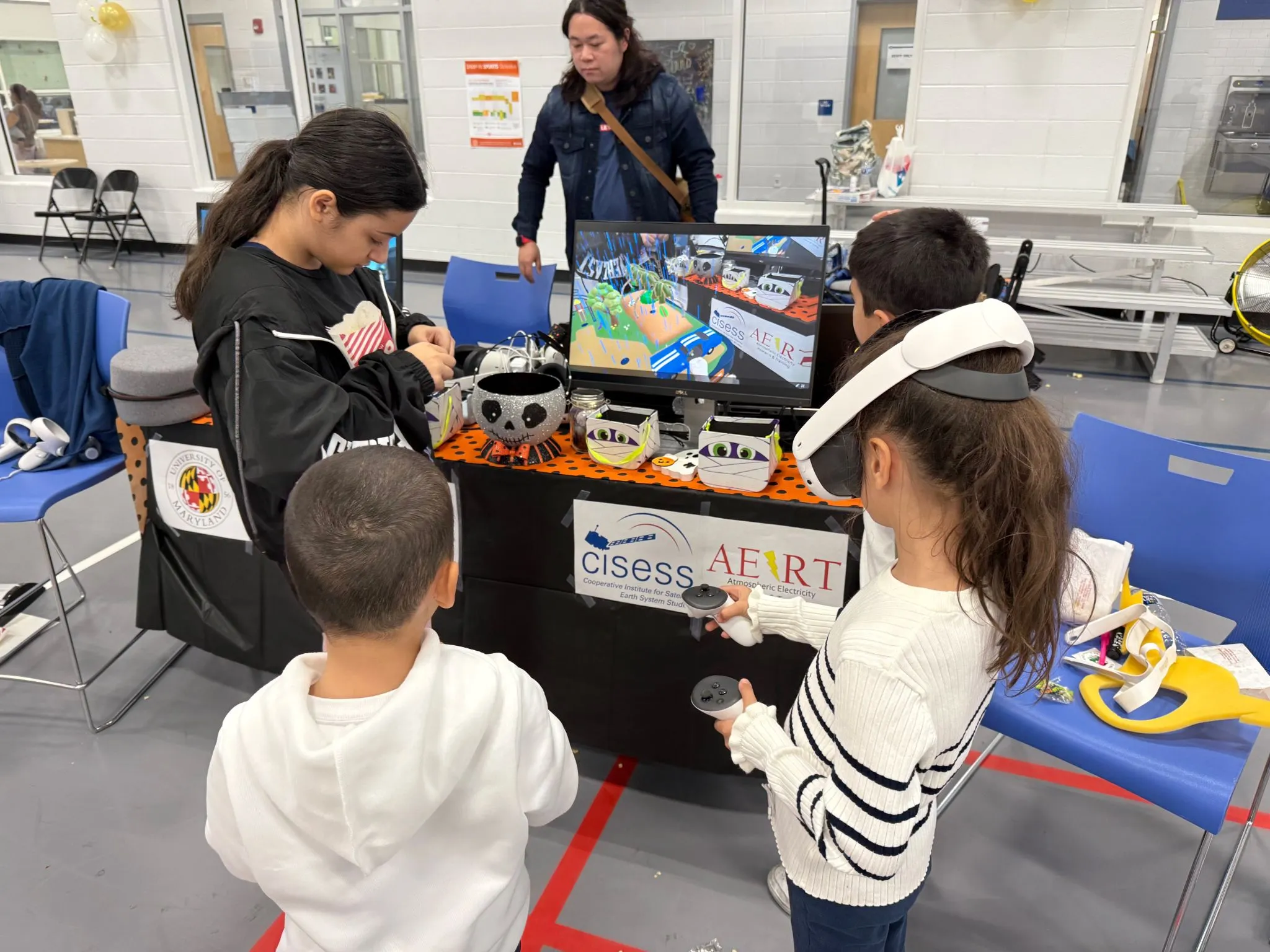 A group of children playing Faraday lightning safety.