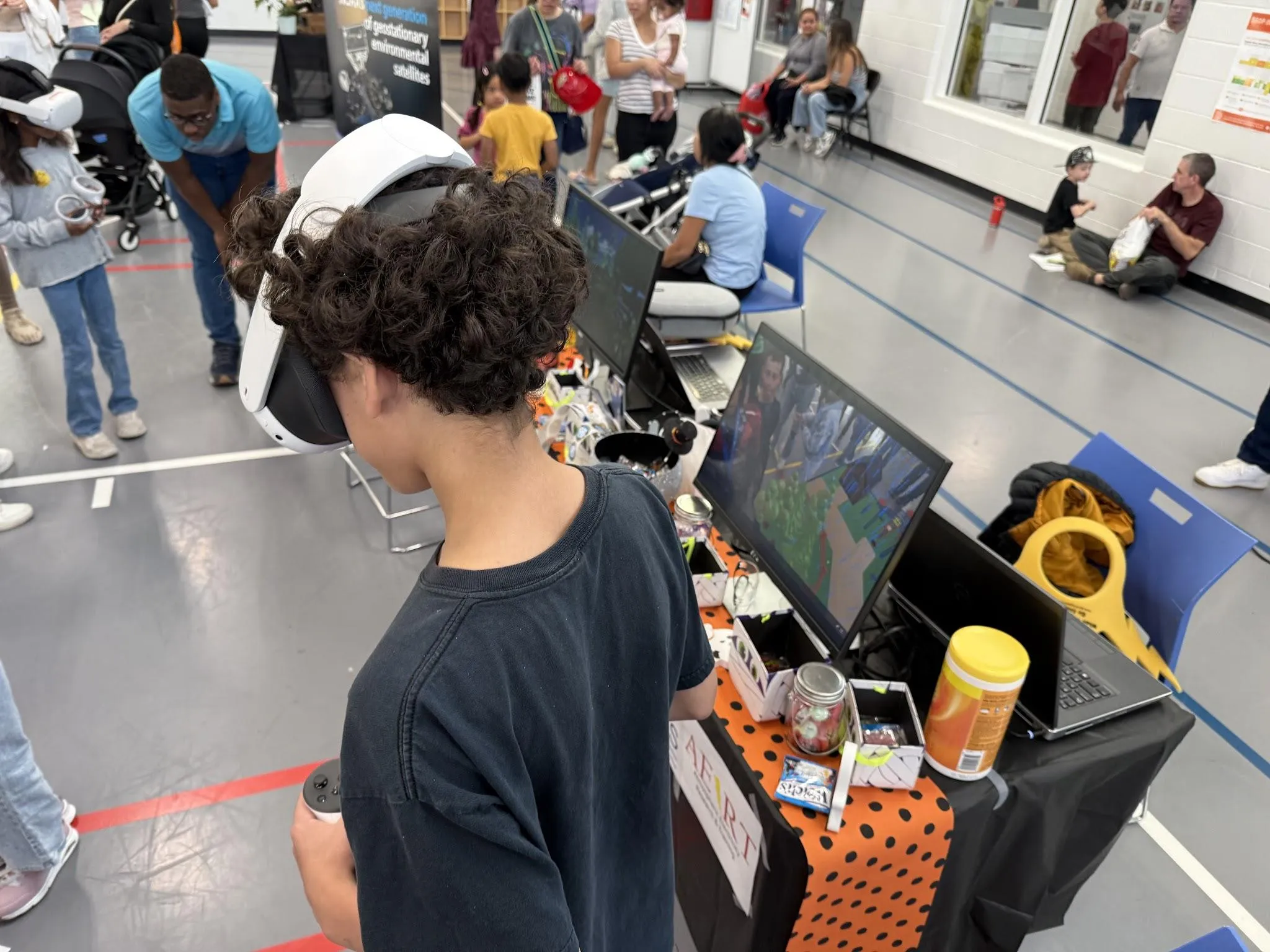 A group of children playing Faraday lightning safety.
